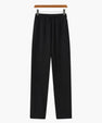 Black casual drawstring pants hanging on wooden hanger for comfortable everyday wear