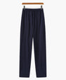 Navy blue casual pants with elastic waistband and drawstring hanging on wooden hanger